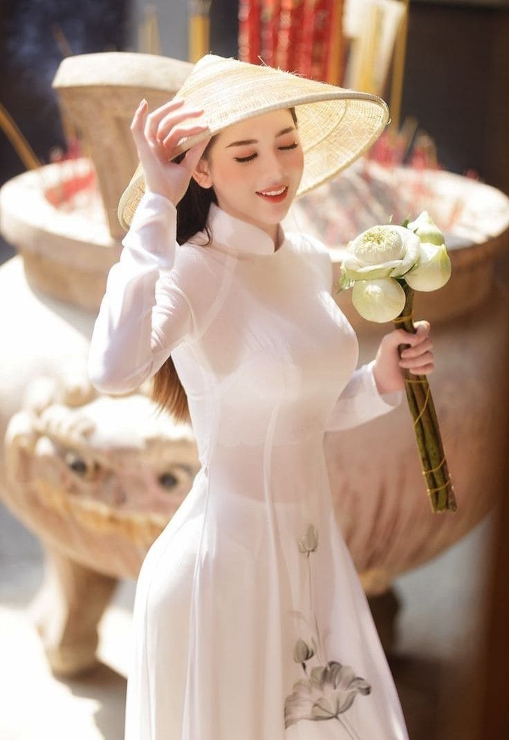 Hình ảnh gái xinh đẹp với tà áo dài cùng chiếc nón lá làm hình nền điện thoại